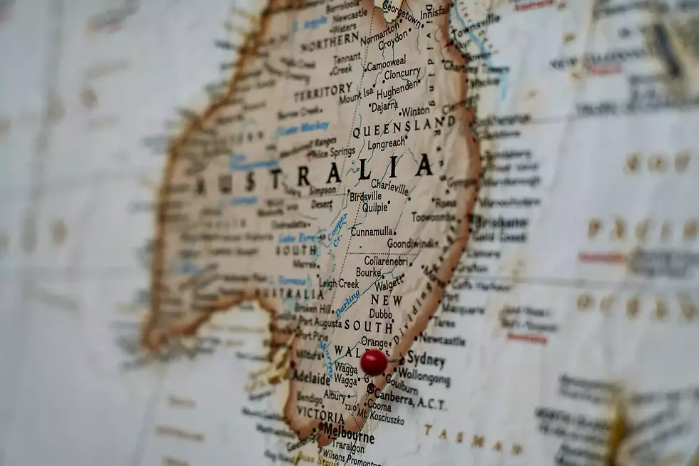 A photo of Australia on a map with a pin in Sydney