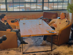 greg wier recording a podcast 