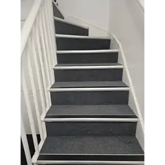 Grey carpeted stairs