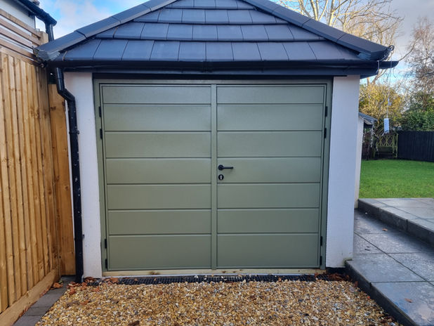 A green garage door
