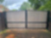 Large grey and black automatic gates