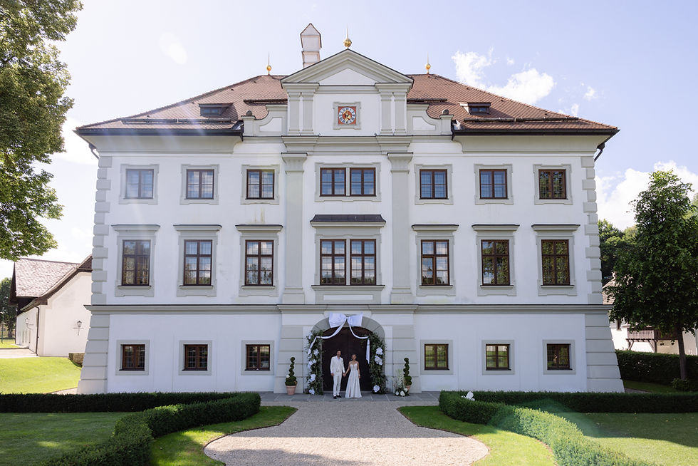 Marlene and Victor outside Schloss Stauff following their intimate civil wedding ceremony, surrounded by the timeless elegance of one of Austria’s most beautiful historic castles.