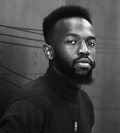 Headshot - Deryl Amenya (KOUZ)_edited.jpg