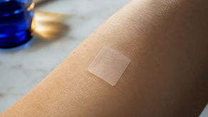 Translucent patch resting on skin