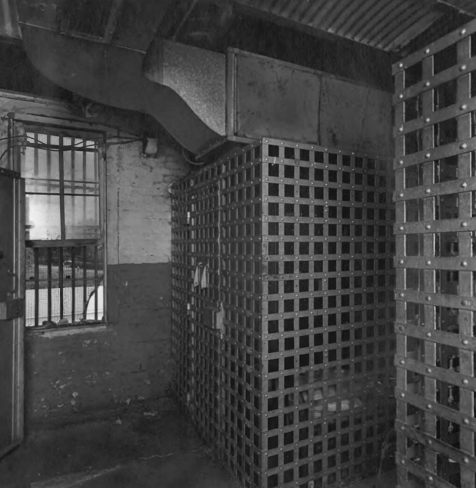 The metal jail cells of the Old Jail as seen in the early 80s.