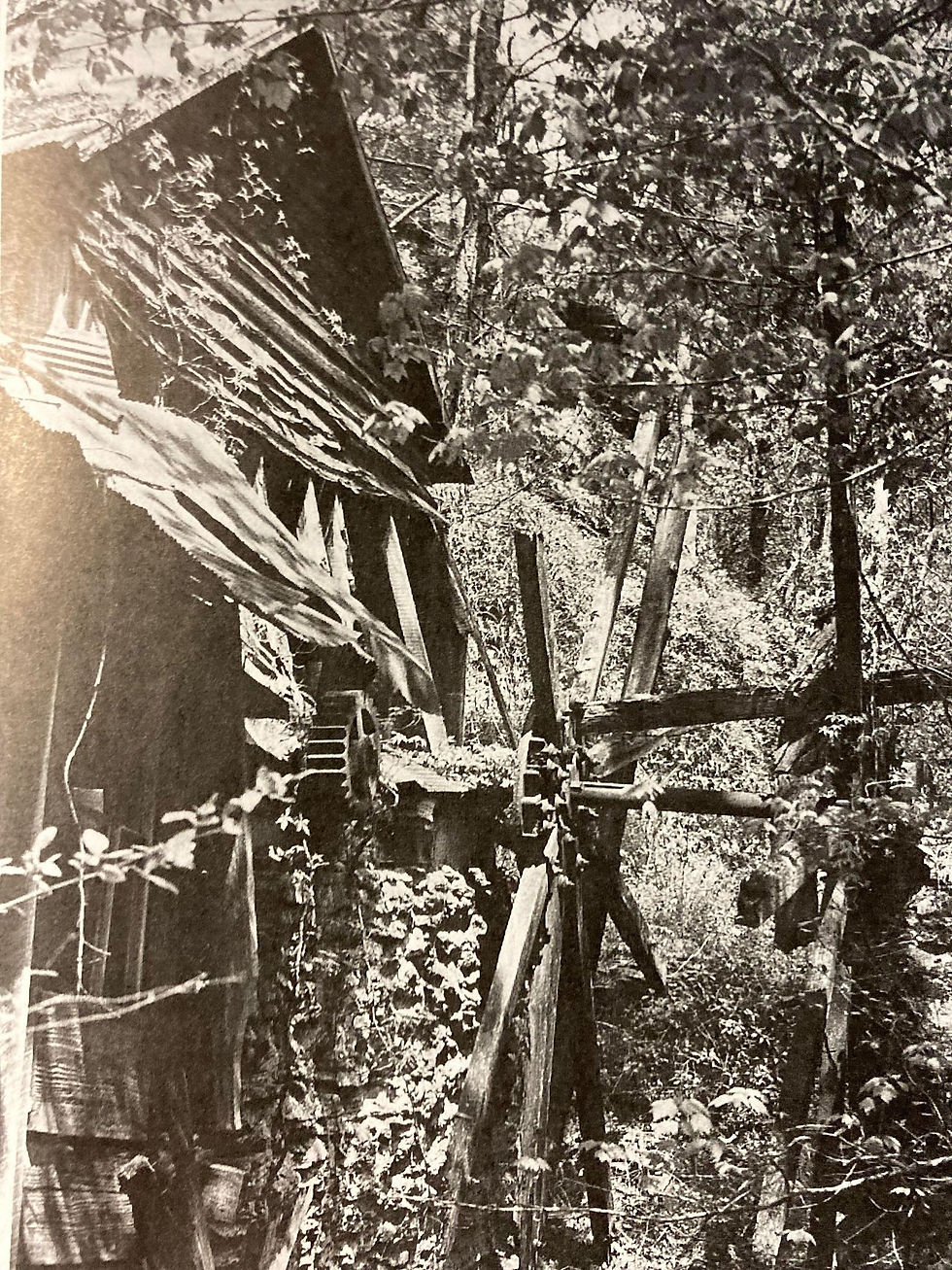 The grist mill ruins when it still had intact wood