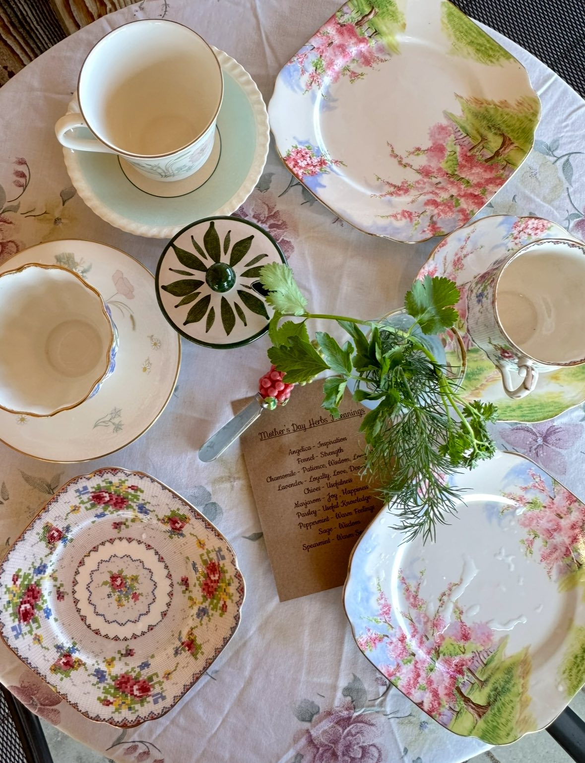Our mother's day high tea table placing, featuring beautiful antique tea cups and food made fresh and locally in the cowichan valley.
