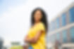 happy-carefree-curly-haired-woman-posing.jpg