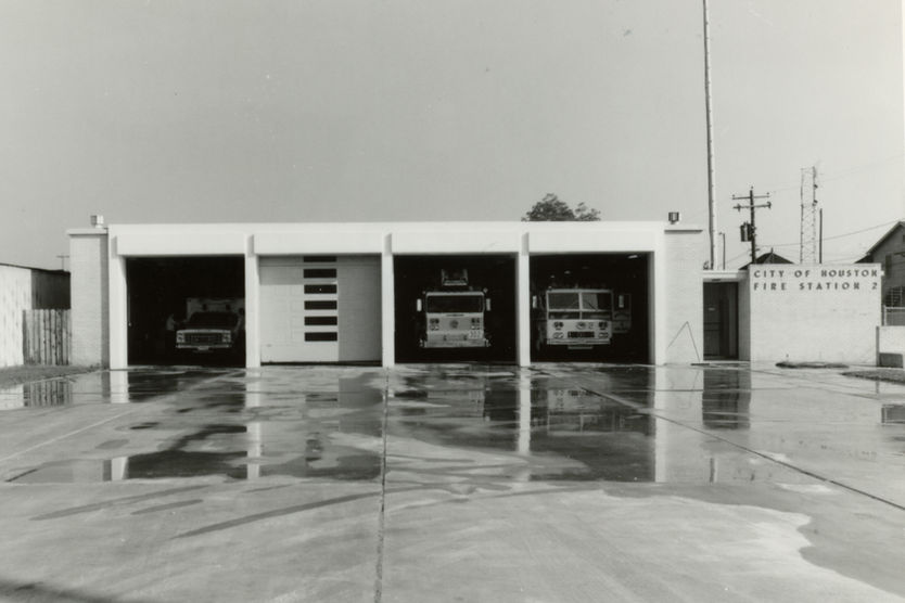 City of Anaheim Fire Station with three bays and fire trucks