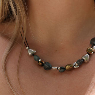 Handmade copper, silver and bronze patinated pebble-shaped beads on wire with sterling silver.