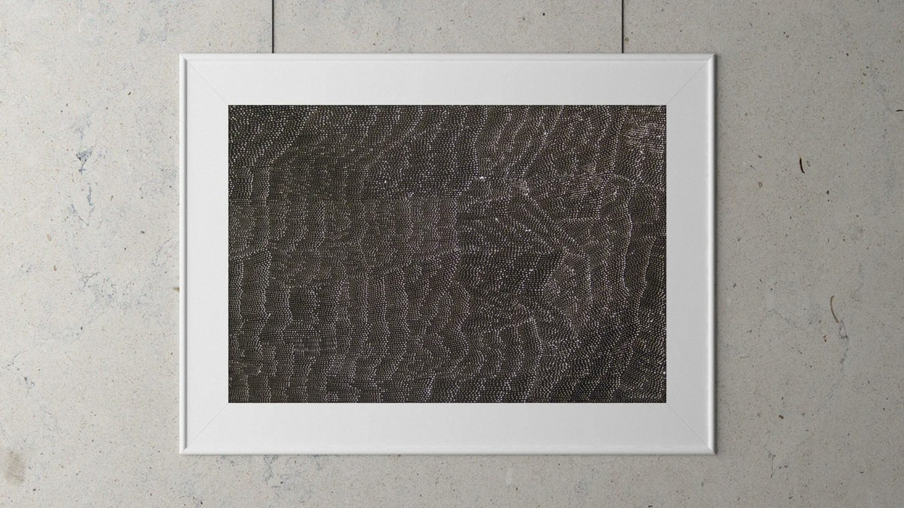 Framed artwork on a concrete wall, Art Index brand photography