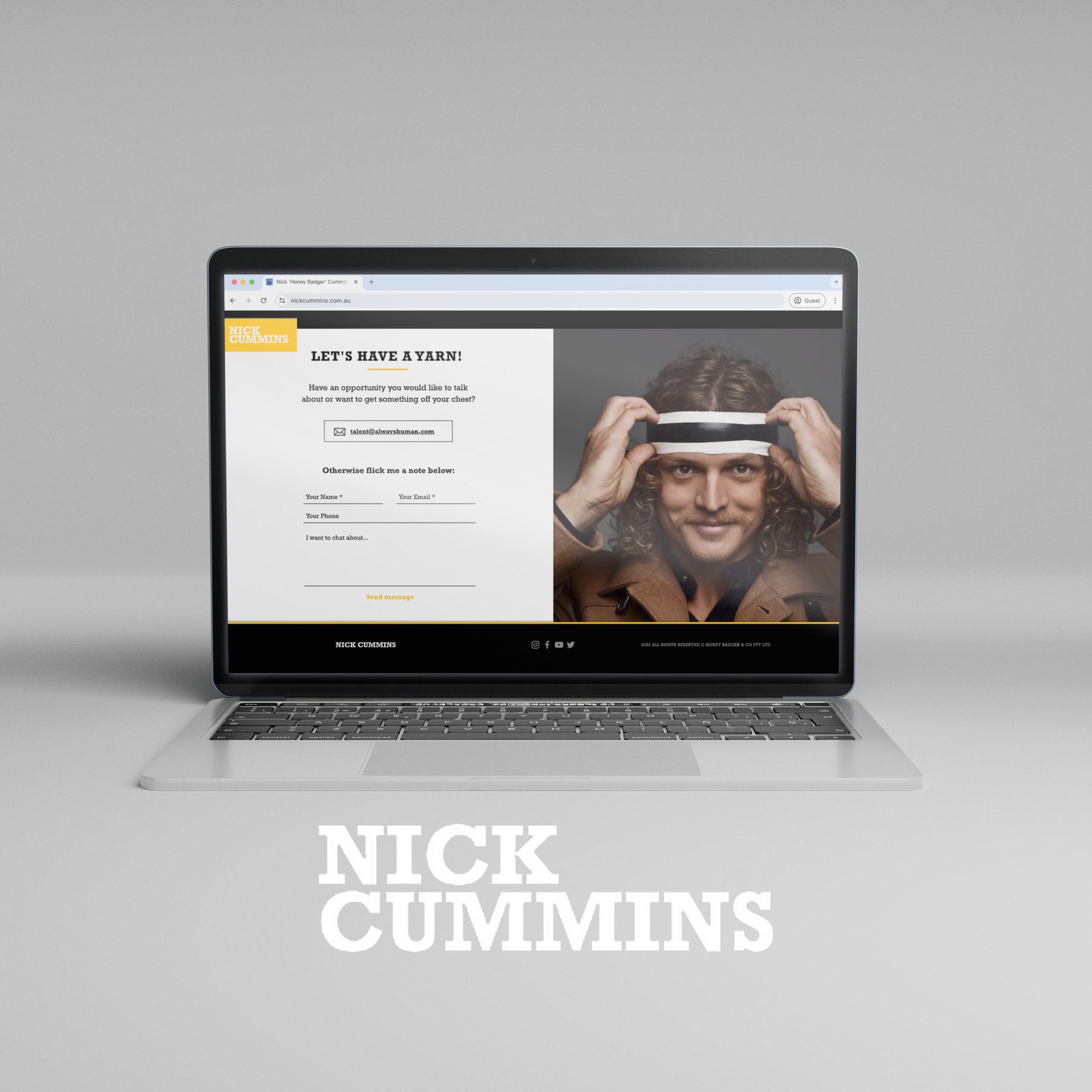 Nick Cummins website contact page on a laptop