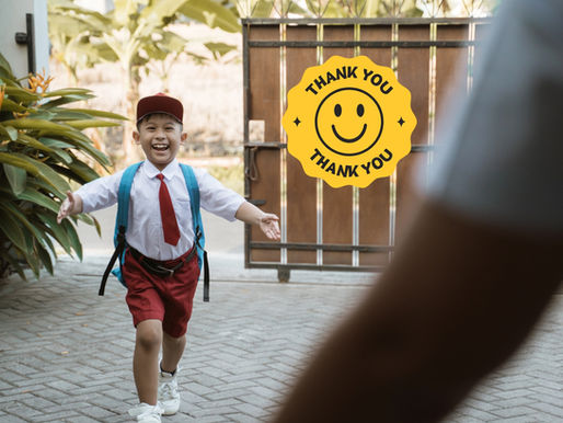 Smiling child in a school uniform runs joyfully with open arms, symbolizing gratitude and freedom, overlaid with a bright yellow “Thank You” smiley badge.