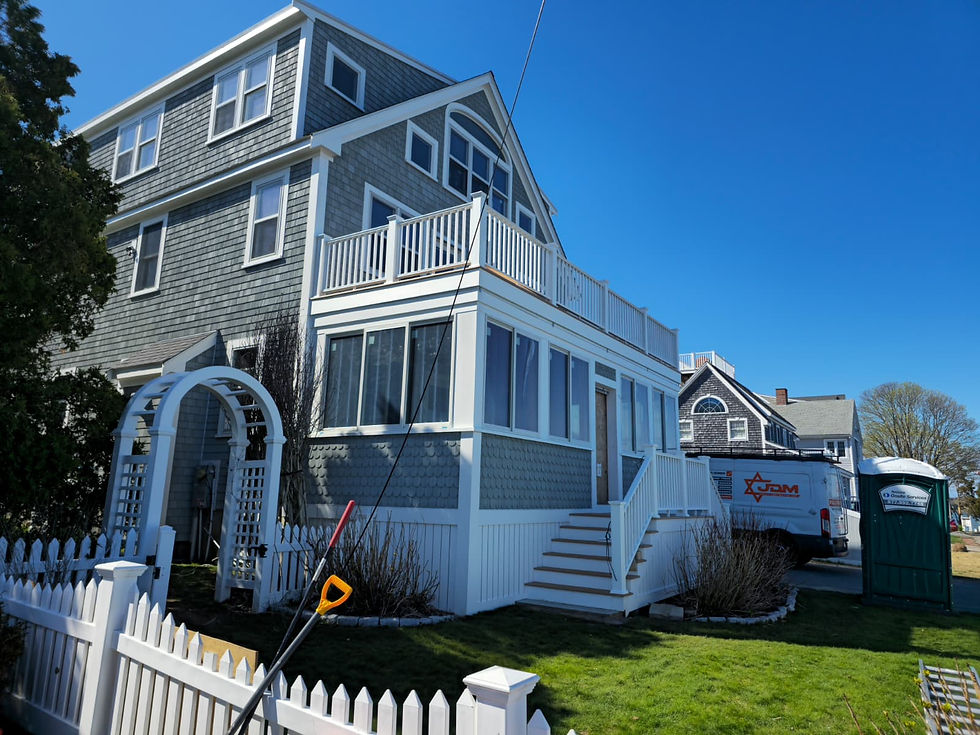 Exterior construction project with siding and trim work in Massachusetts