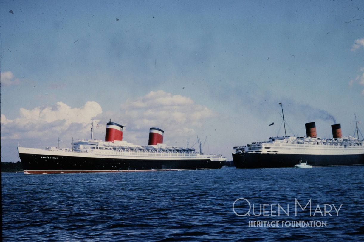 Queen Mary's sister ship Queen Elizabeth passes the American Superliner SS United States at sea