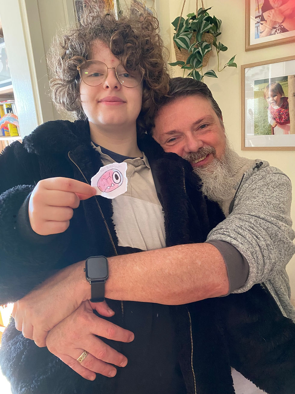 Nat and Shane share a joyful moment after Nat discovers a cherished drawing from the past.