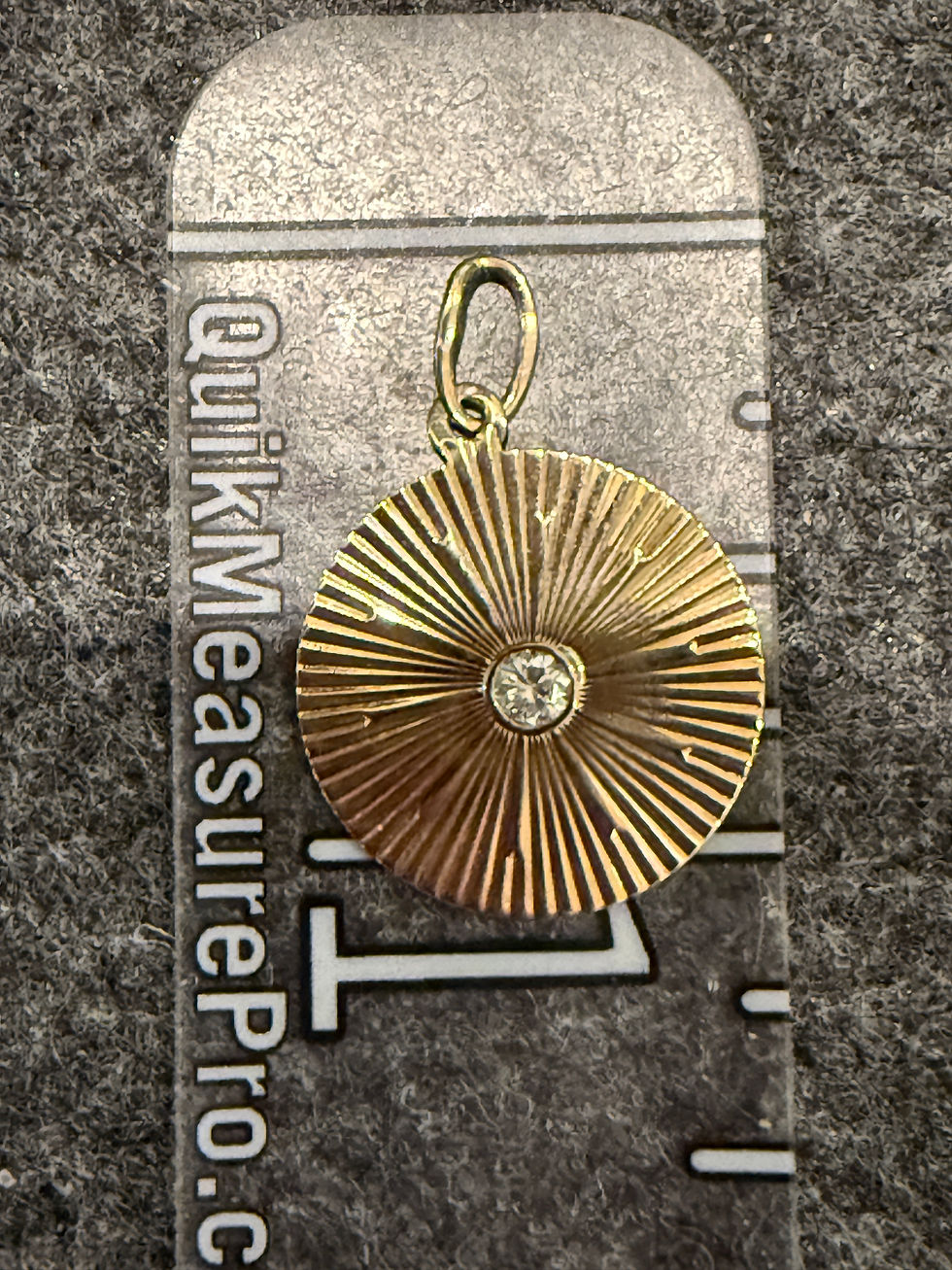 Thumbnail: Vintage engine-turned gold disc pendant featuring a bezel-set natural diamond center and engraved sunburst detailing.