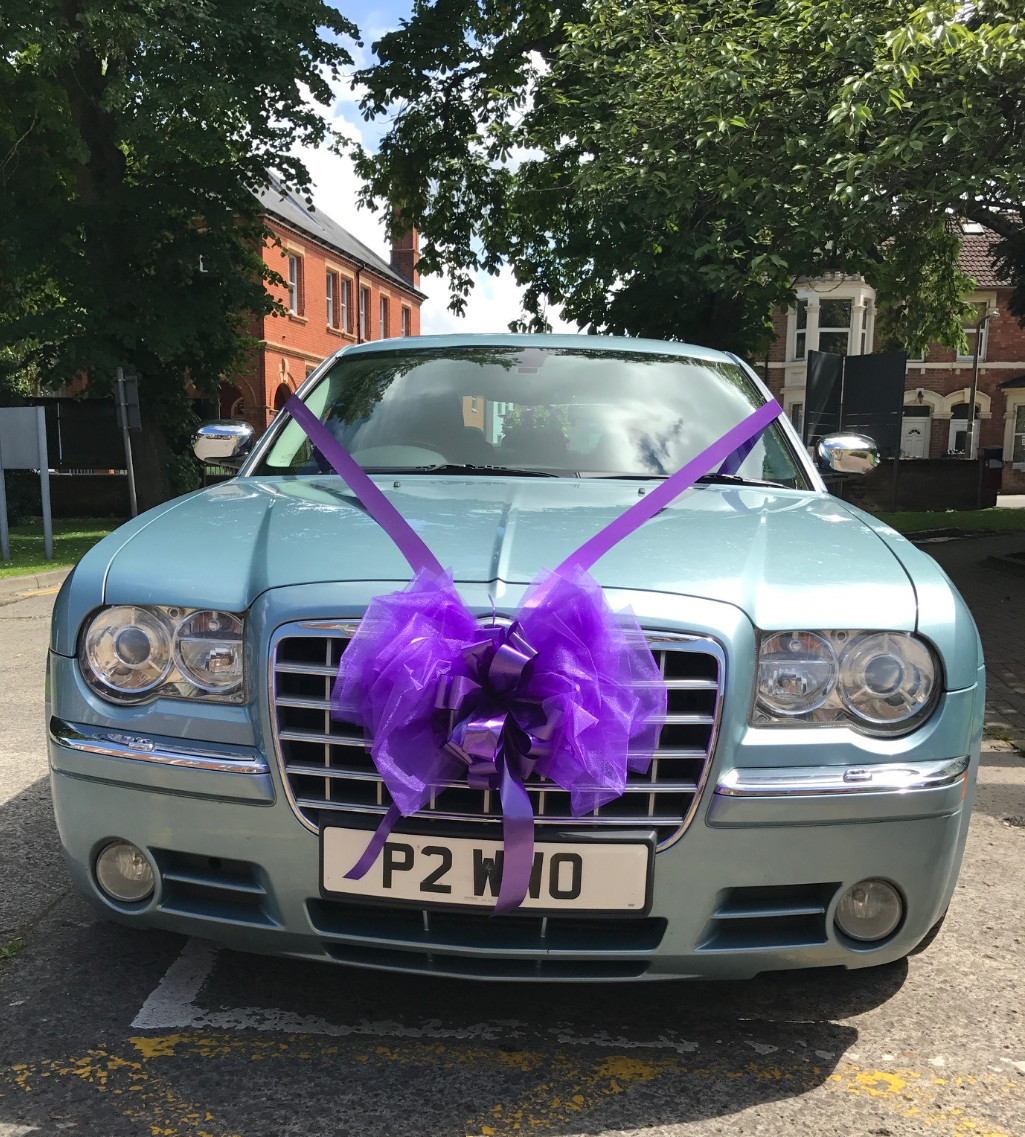 Chrysler decorated with cadburys purple ribbon_edited