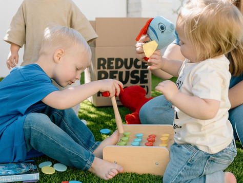 Toddlers playing with montessori toys