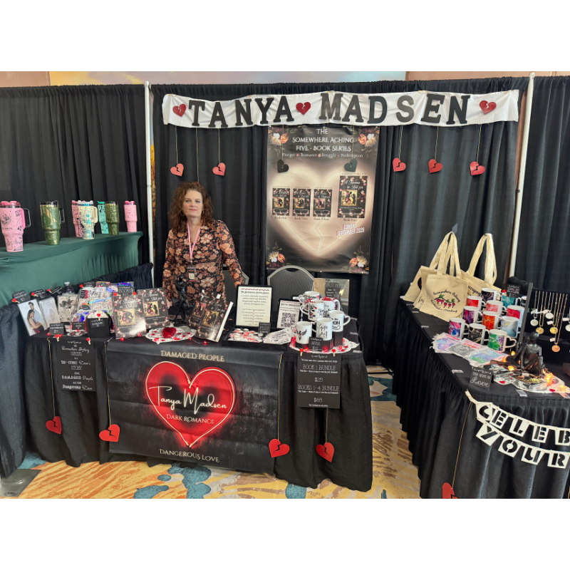 Image of author at book fair booth