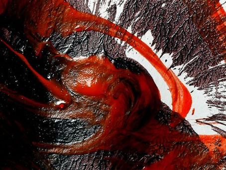 Abstract symmetrical artwork featuring bold red, black, and white brushstrokes mirrored along a vertical axis.