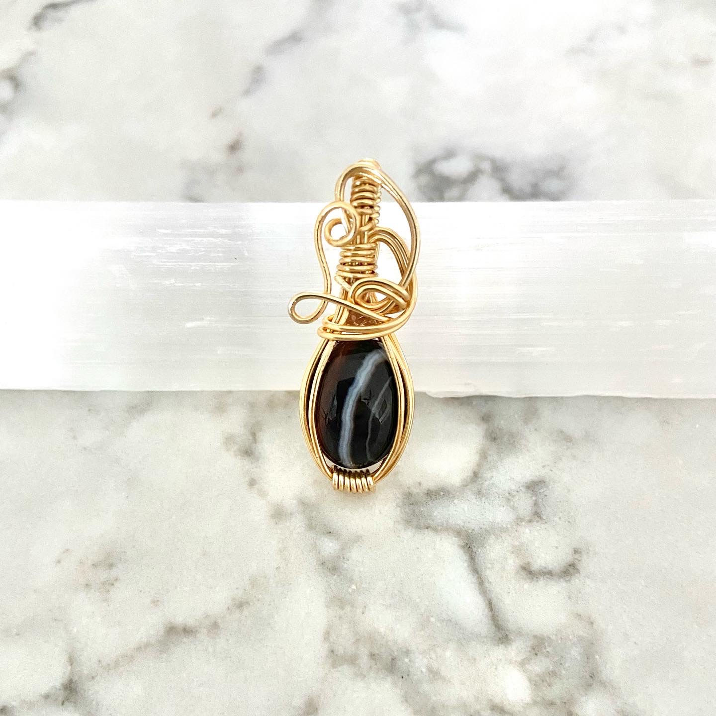 Onyx Wire Wrapped Pendant in Gold