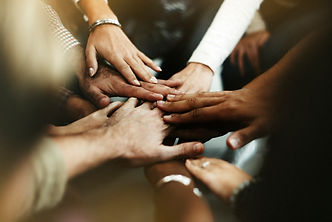 closeup-diverse-people-joining-their-hands.jpg