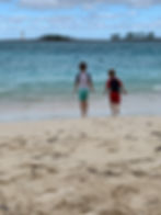 kids at the beach playing on spring break vacation