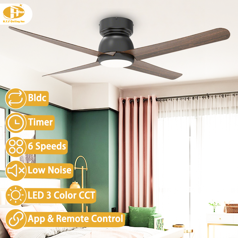 Flush mount ceiling fan with light for bedroom, five wood-grain ABS blades and black housing shown above a bed.
