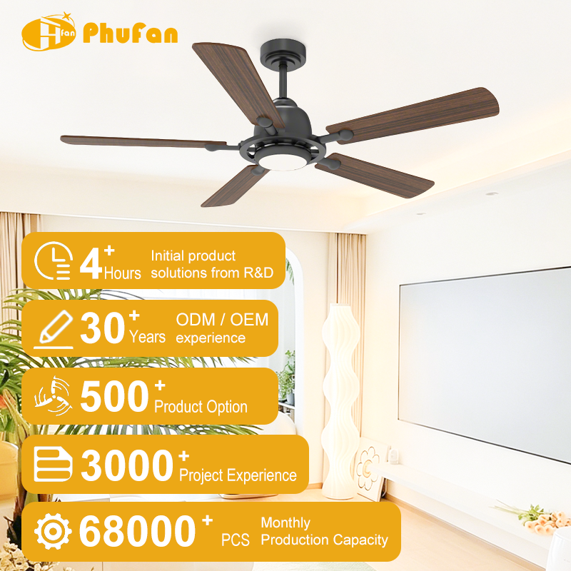 Wood grain ceiling fan with light for bedroom, five blades and black housing pictured above a bed.