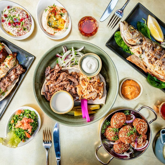 An image displaying the entire menu of 'Paramount Lebanese Kitchen,' featuring a wide variety of authentic Lebanese dishes, from mezze platters to kebabs, salads, wraps, and desserts
