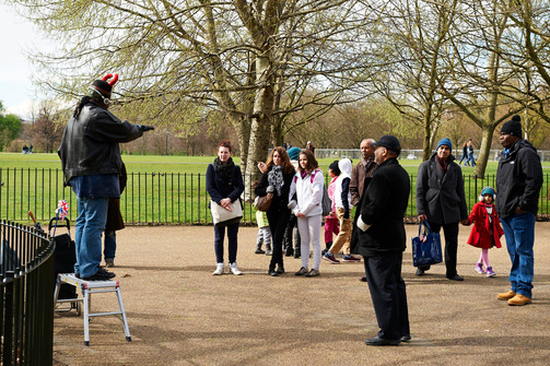 Hyde Park's Speakers' Corner, where individuals express their opinions and engage in public speaking