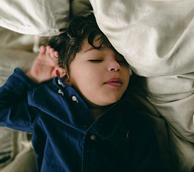 a person lying on a bed_edited.jpg
