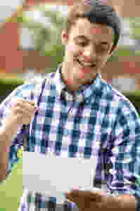 Teenage boy looking at a level results Clearing UCAS fist in air The Parents Guide to