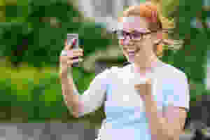 Teenage girl excited A level results day UCAS Clearing The Parents' Guide to