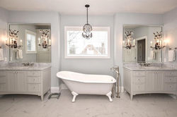 All white traditional master bathroom with claw foot tub