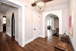 Arched doorways in modern tudor new build