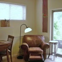 Photo of the sitting area in the Blue Heron Rental Cabin at Well Being Retreat Center