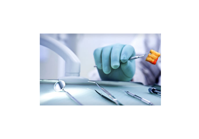 Dentist holds bloody Captain Crunch on the tooth pick tool