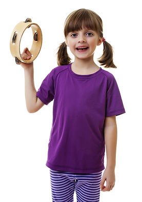 Child holding up tambourine and looking at camera