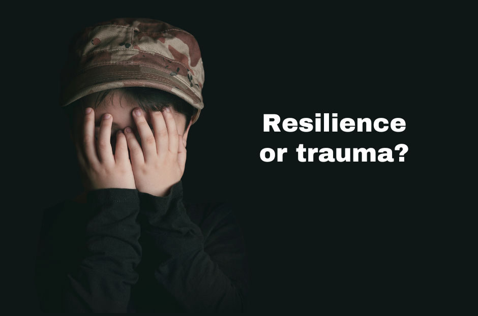 Child covering face with hands