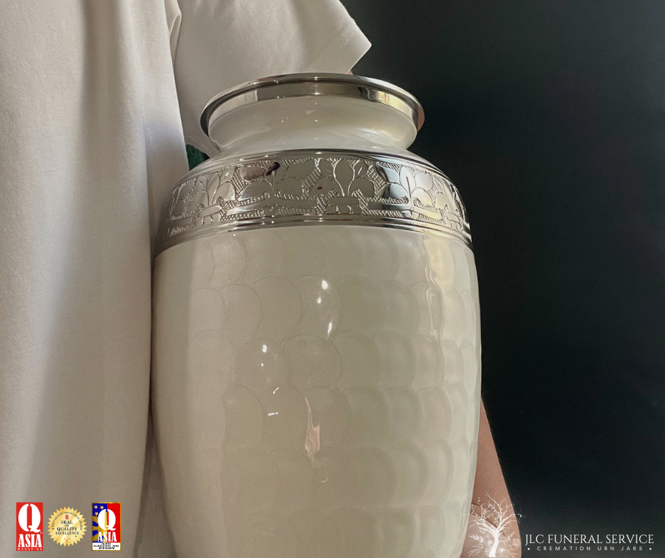 Premium pearl white cremation urn with hand-carved detailing for adult ash remains.