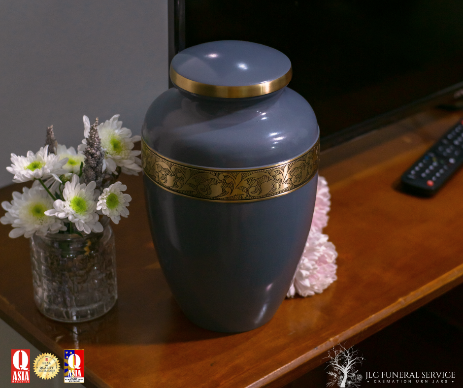 Premium stone blue cremation urn with hand-carved detailing for adult ash remains.