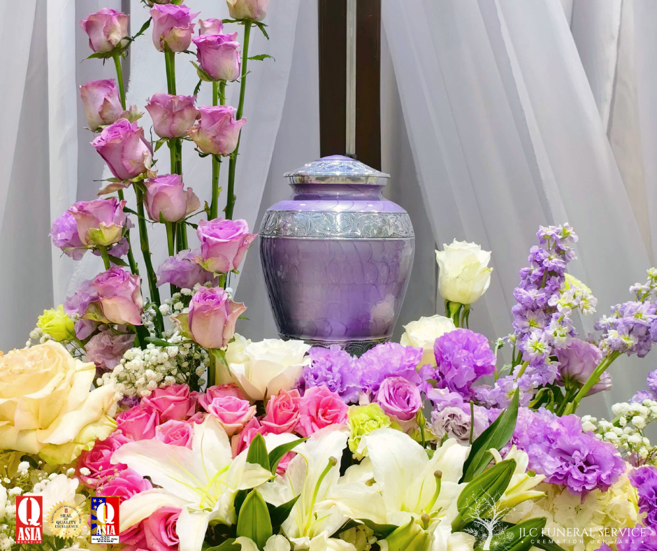 Lavender aluminum cremation urn with stainless accents.