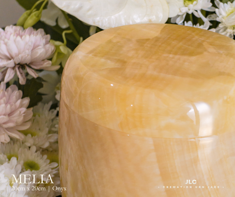 Premium gold onyx cremation urn for adult ash remains.