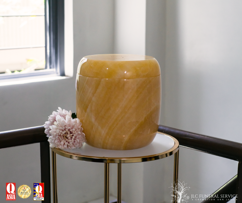 Premium gold onyx cremation urn for adult ash remains.