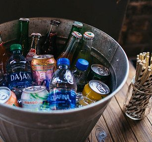 Water and soda drinks setup at the Crossroads, Kansas City venue, included in all-inclusive ceremony, reception, and party packages.