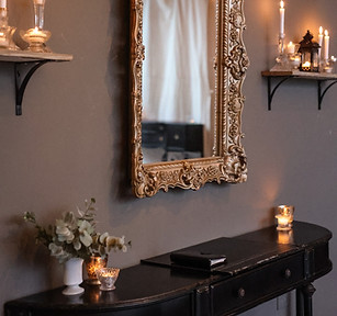 Mirror and license signing table decorated with candles at our Crossroads, Kansas City venue, ready for an intimate wedding ceremony.