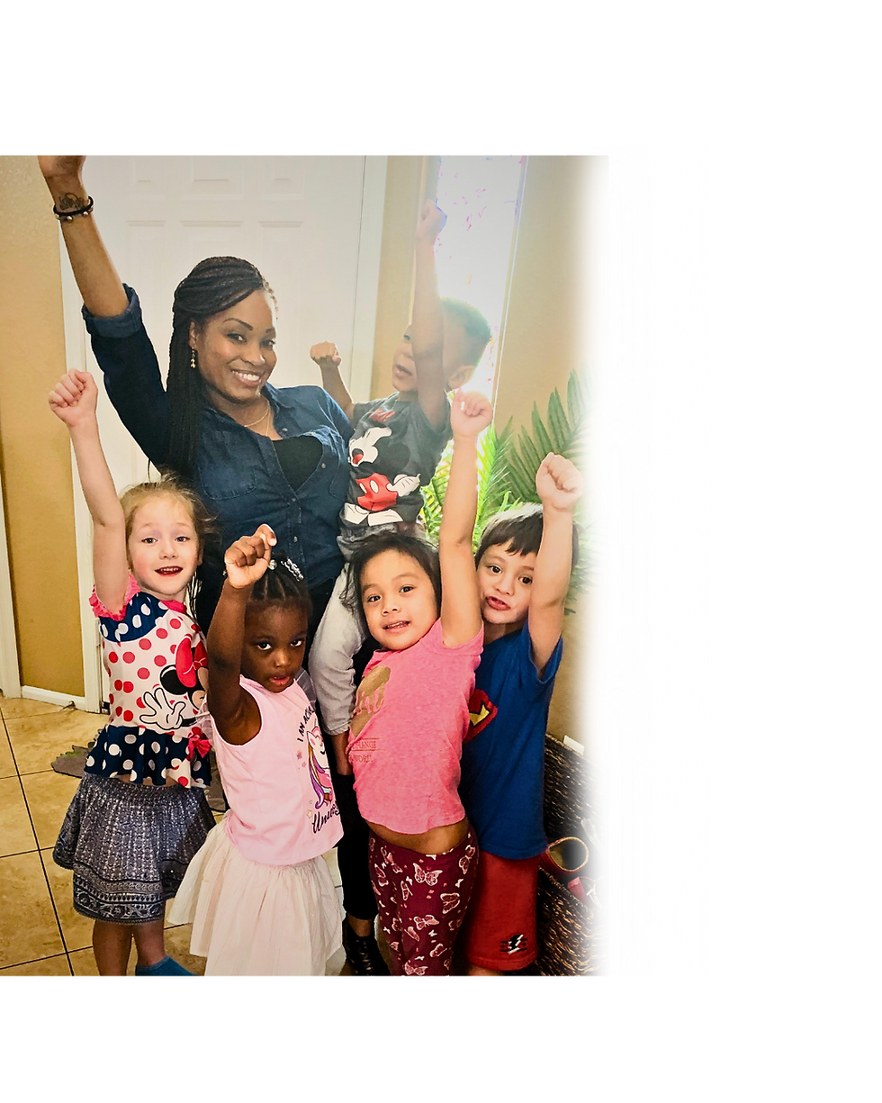 Natasha Wickware is carrying a boy and there are, 4 kids; they are raising their one hands
