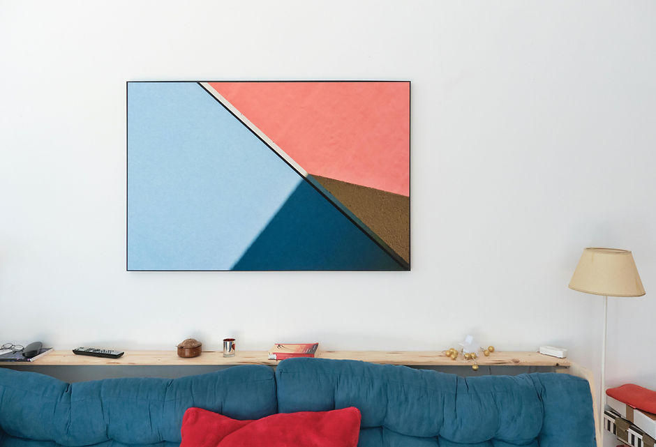 Gemütliches Sofa mit Kunst von Guido klumpe.jpg